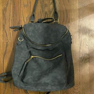 Convertible strap mini backpack